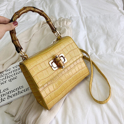 Qiao Bani 2019 new European&American style fashion solid color crocodile pattern bamboo bag hand bag shoulder diagonal cross trend handbags
Qiao Bani 2019 new European&American style fashion solid color crocodile pattern bamboo bag hand bag shoulder diagonal cross trend handbags