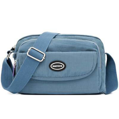 Leisure shoulder bag waterproof slung wallet portable multilayer nylon canvas bag mother bag
Leisure shoulder bag waterproof slung wallet portable multilayer nylon canvas bag mother bag