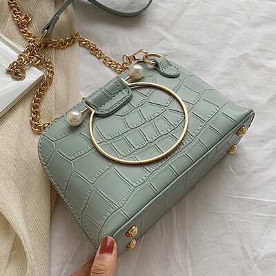 In the summer of 2019 the new shell bag the Korean version the fashion crocodile print handbag the tide of the single shoulder
In the summer of 2019 the new shell bag the Korean version the fashion crocodile print handbag the tide of the single shoulder