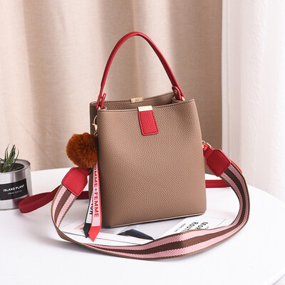 On the new womens bag tide Korean version of Joker shoulder Messenger bag fashion broadband simple bucket bag
On the new womens bag tide Korean version of Joker shoulder Messenger bag fashion broadband simple bucket bag