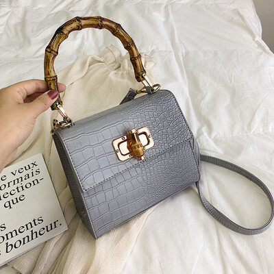 Qiao Bani 2019 new European&American style fashion solid color crocodile pattern bamboo bag hand bag shoulder diagonal cross trend handbags
Qiao Bani 2019 new European&American style fashion solid color crocodile pattern bamboo bag hand bag shoulder diagonal cross trend handbags