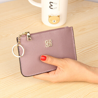The first layer of cowhide Europe&the United States big ladies leather short paragraph purse zipper mini lychee with ring key bag
The first layer of cowhide Europe&the United States big ladies leather short paragraph purse zipper mini lychee with ring key bag