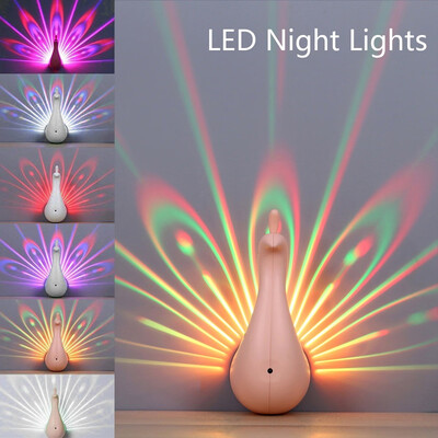 7 Color Changing Peacock Projection LED Night Light Wall Lamp Home Decoration Light With Remote Control
7 Color Changing Peacock Projection LED Night Light Wall Lamp Home Decoration Light With Remote Control