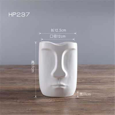 Nordic creative abstract Human Face Decoration figurines ceramics flower vase home decorations accessories crafts
Nordic creative abstract Human Face Decoration figurines ceramics flower vase home decorations accessories crafts