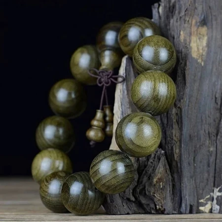 Qiaopin Sichuan gloomy wood gold silk nan hand string men and women models boutique agarwood grade ebony Wenwan Buddha bead bracelet boutique 18mm*13 pieces Qiaopin Sichuan gloomy wood gold silk nan hand string men and women models boutique agarwood grade ebony Wenwan Buddha bead bracelet boutique 18mm*13 pieces