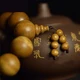 Fanxin gloomy wood golden nan 20mm hand string yellow ebony wood Buddha beads agarwood grade ebony gift black gold gold nan gloomy wood Fanxin gloomy wood golden nan 20mm hand string yellow ebony wood Buddha beads agarwood grade ebony gift black gold gold nan gloomy wood
