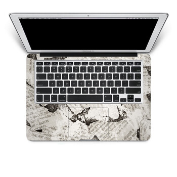 SkinAT 苹果笔记本MacBook手托保护贴膜 不含键盘 3M材料 凌乱的报纸 Pro 17