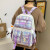 索亚特  书包女韩版小学生初中生简约百搭大容量背包可爱小清新格纹双肩包四件套 紫色+小鸭挂件