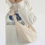 木丁丁今年流行大容量帆布包小众设计简洁轻复古休闲饺子包学生上课斜挎 米白色 +小包