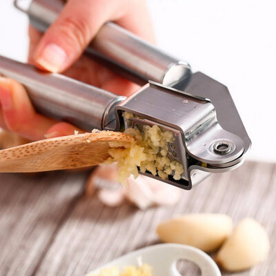 

Stainless Steel Kitchen Crusher Garlic Presses Gadget Vegetable Grinder