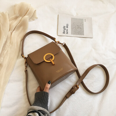 

Hong Kong wind texture net red new bucket bag women 2019 new Korean version of simple hand bill of lading shoulder slung womens b
