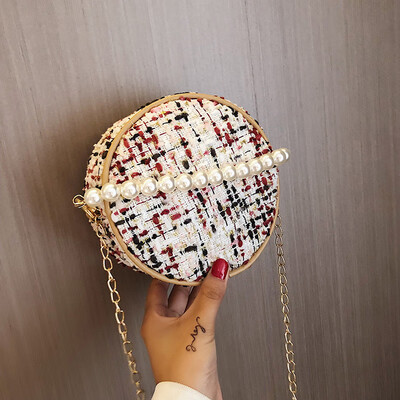 

2019 new fashion pearl handbag female literary sen woven bag casual wild chain shoulder Messenger bag