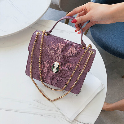 

Qiao Bani 2019 new European&American style fashion BV snake snake head flip bag bills shoulder diagonal cross trend handbags