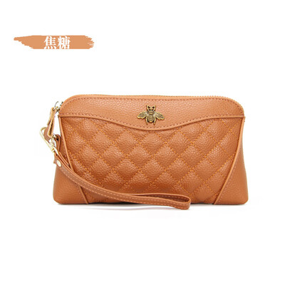 

The first layer of cowhide 2019 new ladies leather Europe&America bee bills position shell type clutch bag long wallet