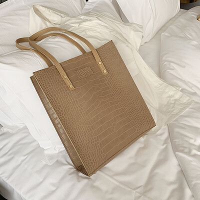 

Korean version 2019 new Korean version large capacity handheld bag fashion 100 lap texture single shoulder bag