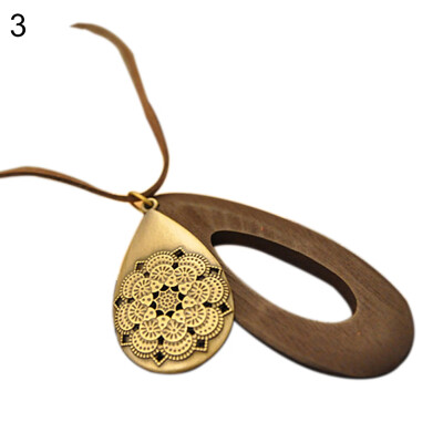 

Women Vintage Hollow Carving Waterdrop Wood Velvet Rope Sweater Necklace Jewelry