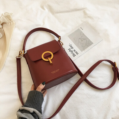 

Hong Kong wind texture net red new bucket bag women 2019 new Korean version of simple hand bill of lading shoulder slung womens b