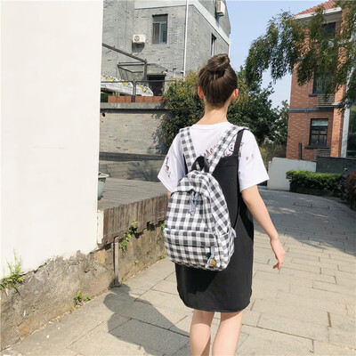 

Girl plaid schoolbag female Korean version of high school students campus small fresh backpack double shoulder bag girl