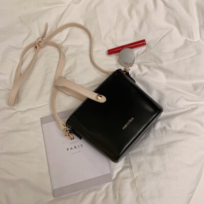 

Ins network celebrity texture simple handheld bucket bag woman 2019 new Korean version of early spring bag single shoulder oblique