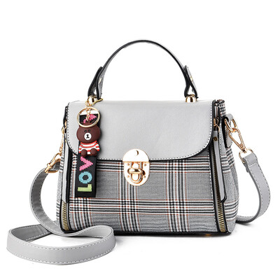 

In summer new bags of women with large capacity slung ladies stripes simple portable Korean version of Joker foreign style