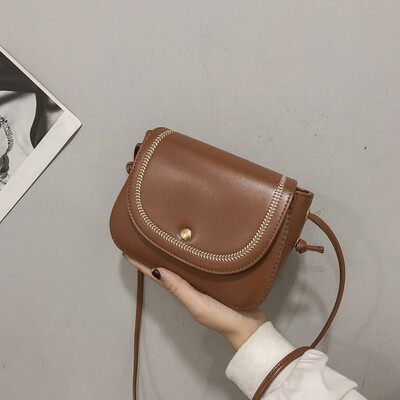

Casual wild small fresh temperament embroidered line Messenger bag female 2019 new fashion simple solid color retro shoulder bag