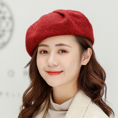 

Wholesale new autumn&winter solid-colored fur-tie lady wool knitted painter hat fashion beret