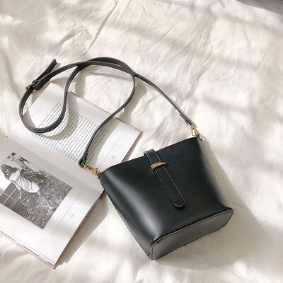 

Qiao Bani 2019 new South Korea ins fashion simple solid color pumping bucket bag shoulder diagonal trend handbags