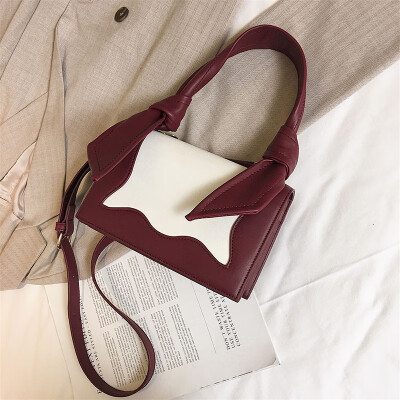 

Qiao Bani 2019 new European&American style fashion magazine with the same paragraph color PU flip bag hand strap shoulder diagonal female bag