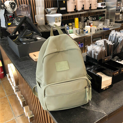 

Ins bag girl Korean version of high school students simple Sen tied the ancient sense of girls light backpack Japanese double sho