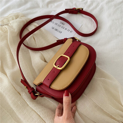 

Summer new small bag female 2019 new wave Korean version of the wild single shoulder slung fashion contrast color semi-circle saddle bag