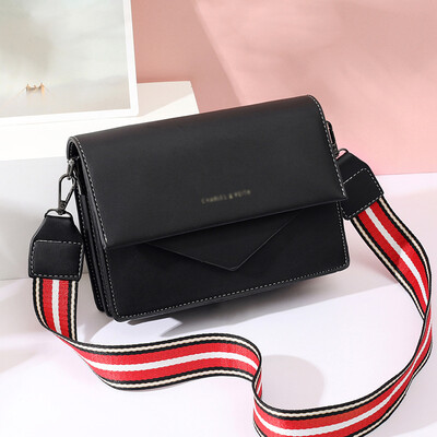 

Korean version of one shoulder slung ladies bag geometric stitching 2019 new wide shoulder strap casual fashion small square bag
