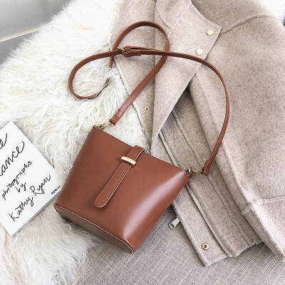 

Qiao Bani 2019 new South Korea ins fashion simple solid color pumping bucket bag shoulder diagonal trend handbags