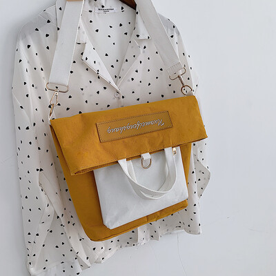 

New casual bag female 2019 new Korean version of the fashion contrast color canvas shoulders versatile shoulder slung tote bag