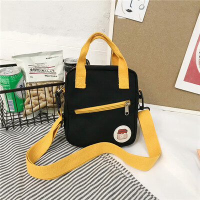 

On the new small bag canvas bag woman single shoulder bag oblique satchel college students hit the color of the ancient girl ins s