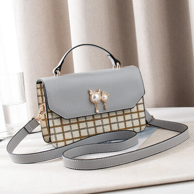 

Summer ins super hot handheld girl on the Korean version of the hundred lap shoulder slant bag fashion