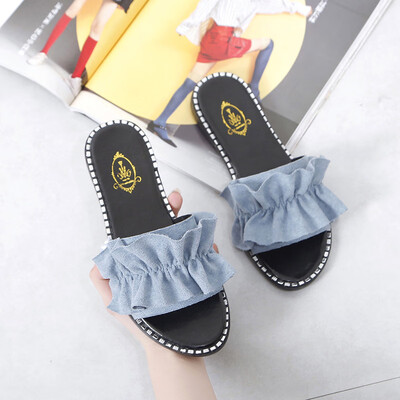 

Slide women wear flat with the 2019 new Korean version with a flower line to drag students cold slipper beach shoes