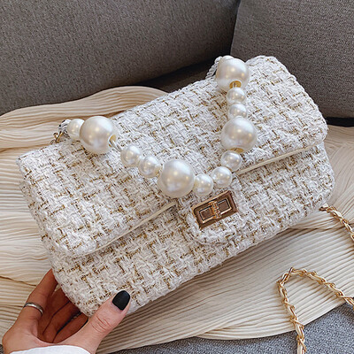 

North bag womens bag 2019 autumn new lock wool small square bag net red with single shoulder slung Pearl chain bag