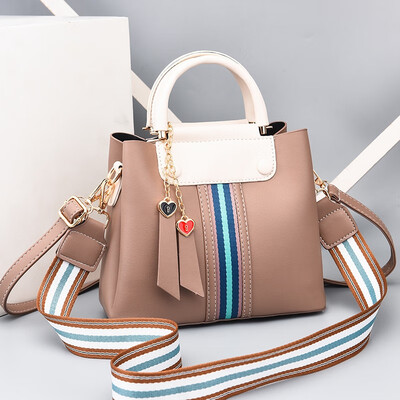 

Baggage ladiesnew fashionable Korean version of Baitao ladies collision color bucket bag with one shoulder straddle handbag