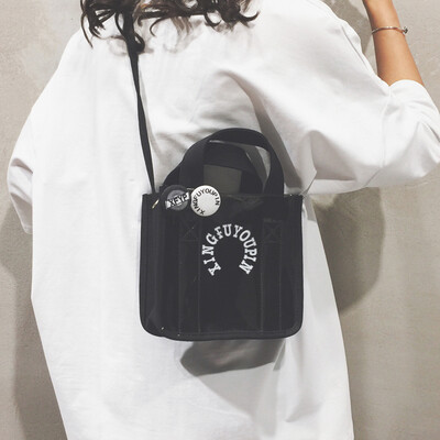 

Portable transparent bag canvas bag handbags new 2019 students Korean version of the slung Japanese girls cute shoulder bag tide