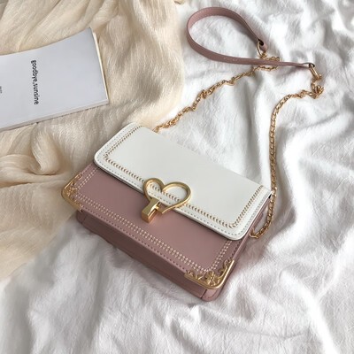 

Chic wild fashion temperament contrast color shoulder bag female 2019 new embroidered line peach heart-shaped lock buckle Messenger bag