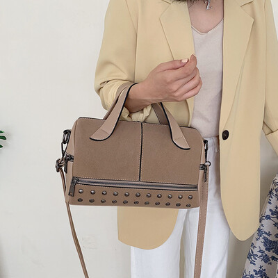 

Ins super fire bag female bag new 2019 Korean version of the fashion rivet texture wild shoulder slung Boston bag