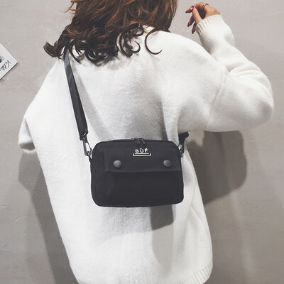 

2019 new Korean version of the wild letter printing shoulder bag ins canvas bag female slung casual broadband student bag