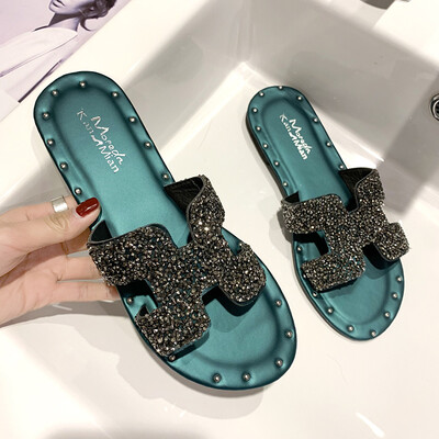 

Non-slip female summer wearwomen shoes flat-soled Korean version of cool drag slippers water drill fairy wind beach shoes children