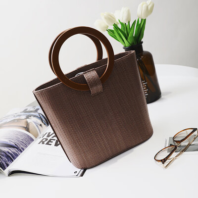 

2017 summer new Korean version of the straw wrapped wood ring handbag simple shoulder bag large capacity package