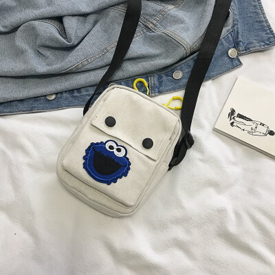 

2019 new cute cartoon simple wild shoulder Messenger bag female casual fashion ugly cute Sesame Street canvas bag