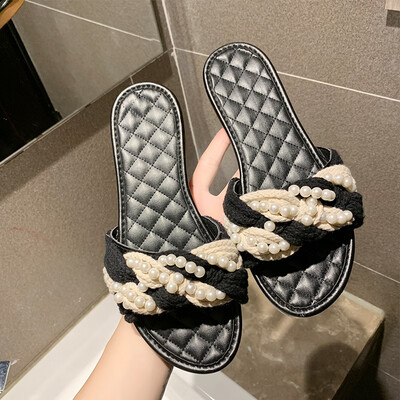 

Net red slippers womens fashion wear 2019 new twist woven pearl beach shoes flat bottom drag holiday shoes