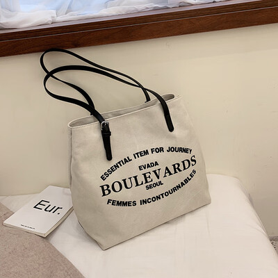 

Ins large capacity canvas womens bag 2019 new bag Korean version 100 big bag student schoolbag fashion single shoulder bag