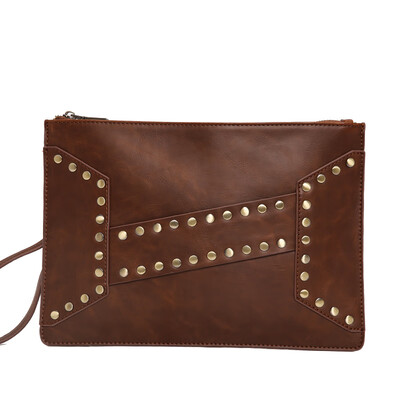 

Retro fashion wrist bag tide cool rivet young men&women holding a bag Korean leather hand grab envelope bag