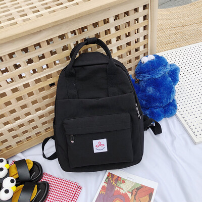 

Junior high school student bag female Korean version of high school students campus ins wind large capacity backpack vintage sense girl backpack