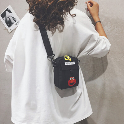 

Net red small bag female bag new 2019 Korean version of Harajuku student canvas bag Sesame Street Messenger bag girl ins